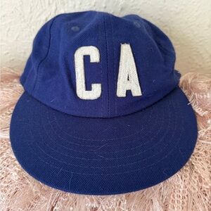 Free People Blue Baseball Cap with White 'CA' Iron & Resin